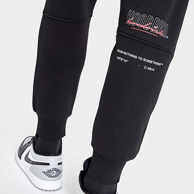 On Model 5 view of Men's Hoodrich OG Blend Graphic Print Jogger Pants in Black/Iron Gate/Lychee Click to zoom