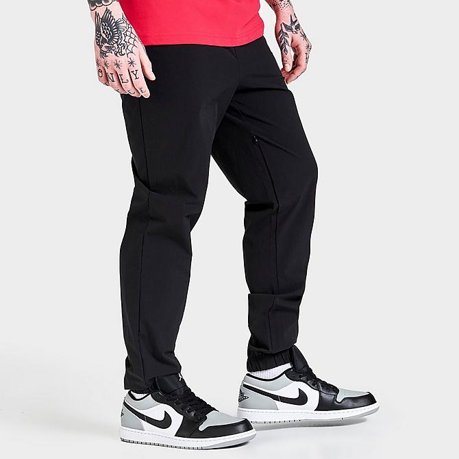 Back Left view of Men's Hoodrich OG Fatal Woven Track Pants in Black/Irongate/Lychee Click to zoom