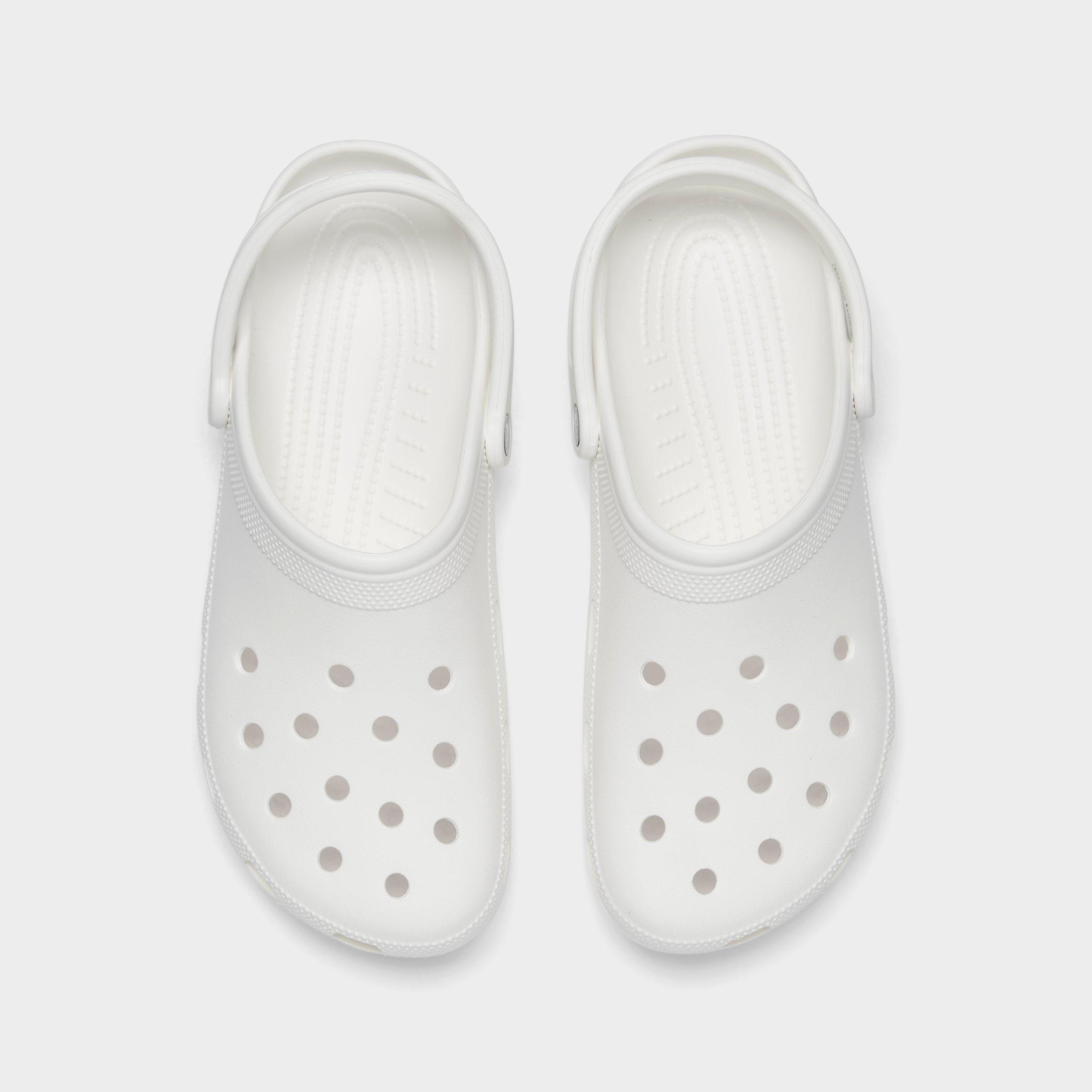 white crocs with colorful words