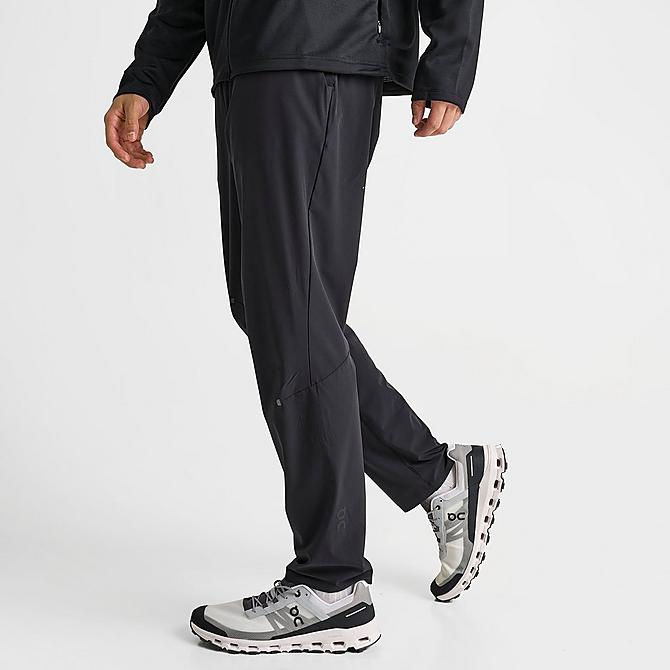 Back Left view of Men's On Movement Pants in Black Click to zoom