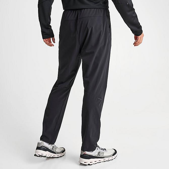 Back Right view of Men's On Movement Pants in Black Click to zoom
