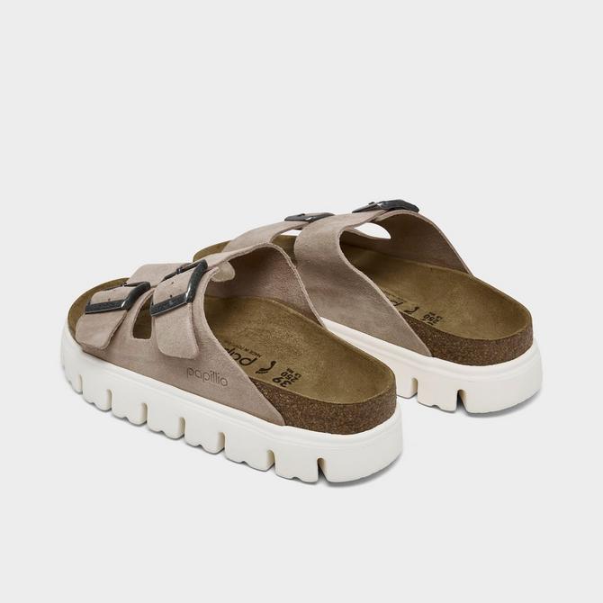 Left view of Women's Birkenstock Arizona Chunky Birko-Flor Platform Sandals in Warm Sand Click to zoom