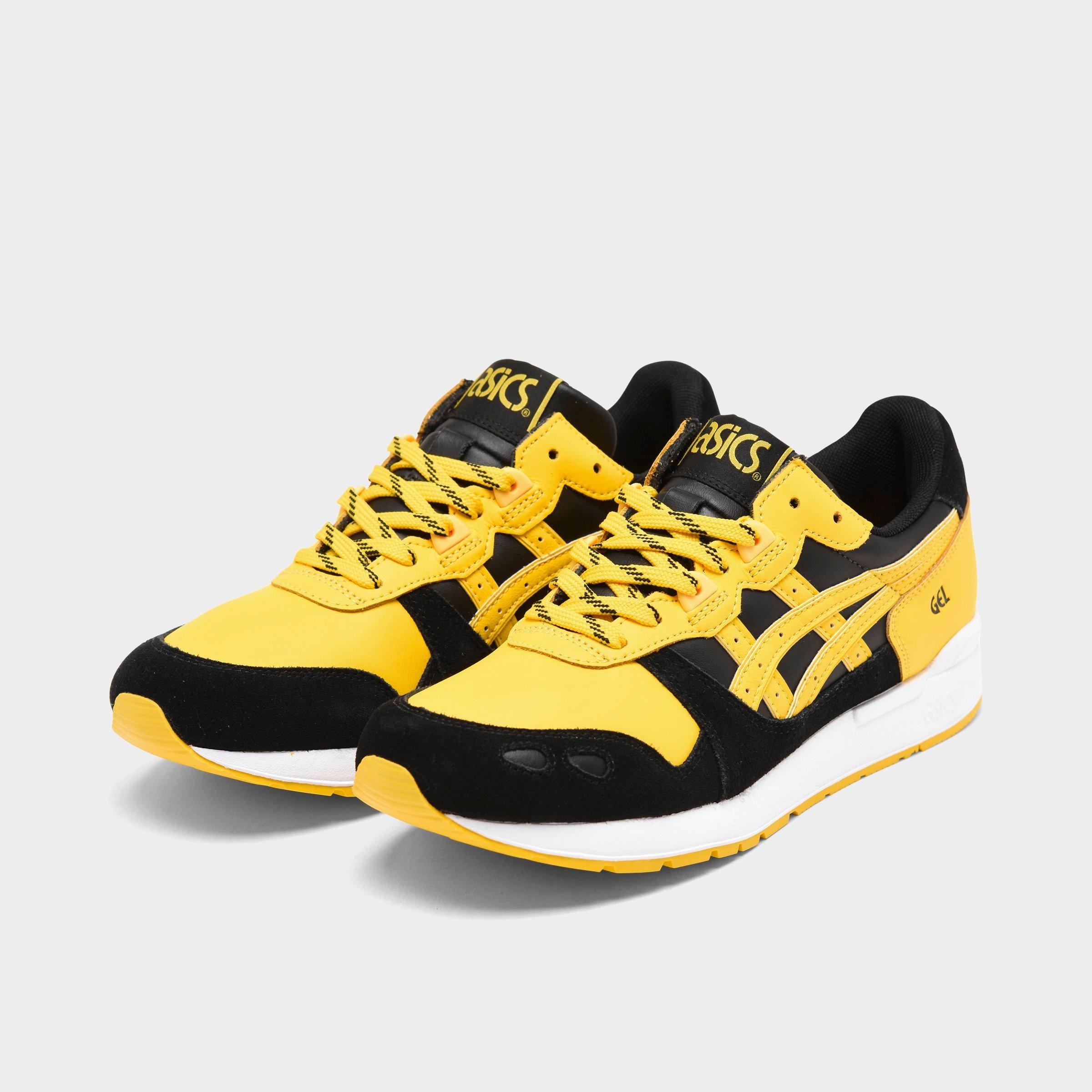 asics black and yellow shoes