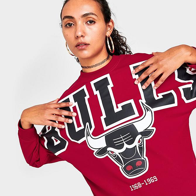 On Model 5 view of Women's Mitchell & Ness Chicago Bulls NBA Fleece Crewneck Sweatshirt in Red Click to zoom