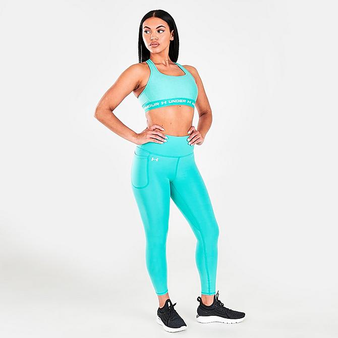 Front Three Quarter view of Women’s Under Armour Mid Crossback Heather Medium-Support Sports Bra in Neptune Click to zoom