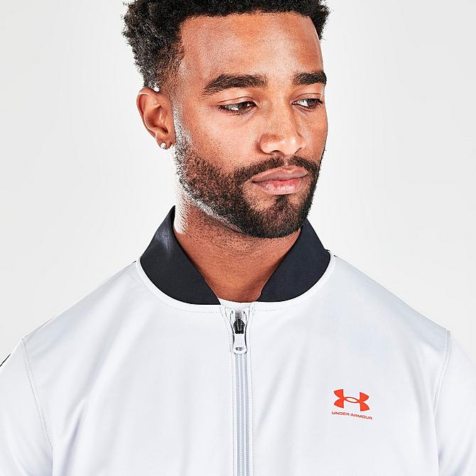 On Model 5 view of Men's Under Armour Tricot Track Jacket in White/Orange Click to zoom