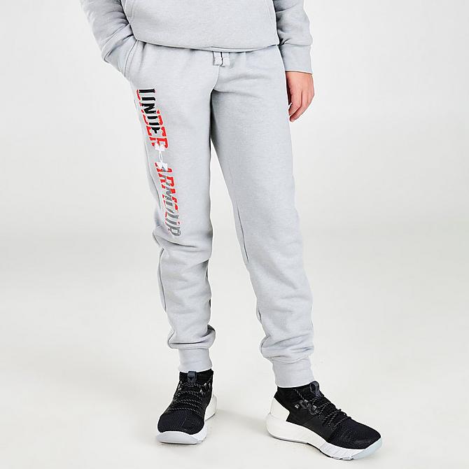 Front Three Quarter view of Boys' Under Armour Dual Logo Jogger Pants in Heather Grey Click to zoom