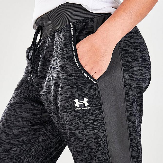 On Model 5 view of Women's Under Armour Twist Fleece Jogger Pants in Black/White Click to zoom