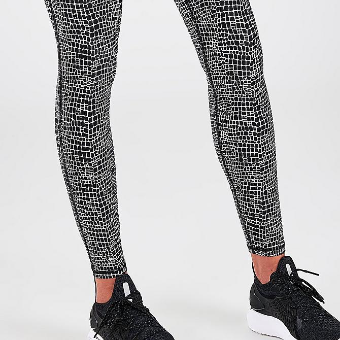 On Model 6 view of Women's Under Armour HeatGear Graphic Print Leggings in Black Click to zoom
