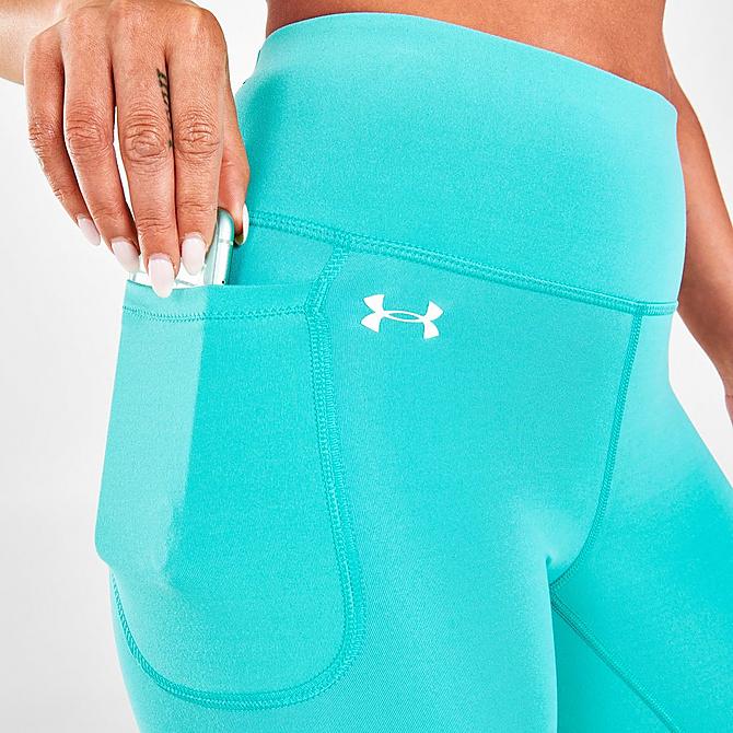On Model 5 view of Women's Under Armour Motion Cropped Leggings in Neptune Click to zoom
