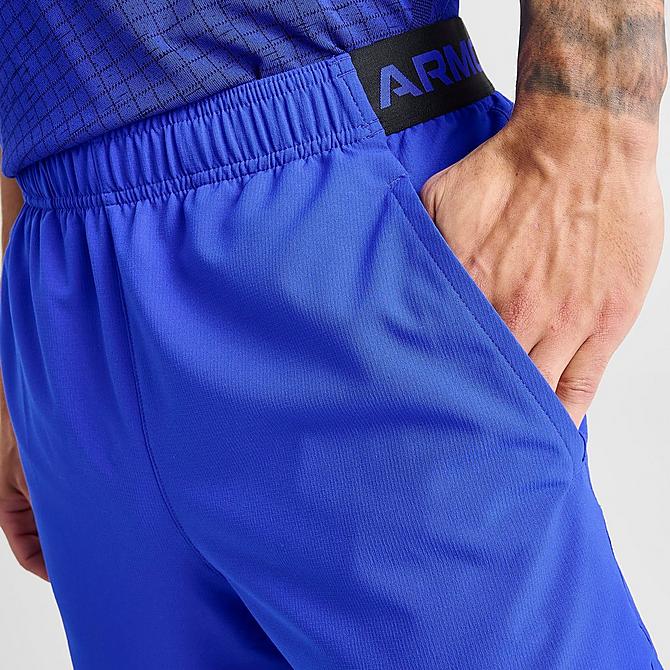 On Model 6 view of Men's Under Armour Vanish 6" Woven Shorts in Team Royal/White Click to zoom
