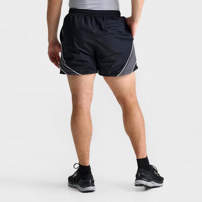[angle] view of Men's Under Armour UA Icon Colorblock Volley Shorts in Black/Black/White Click to zoom