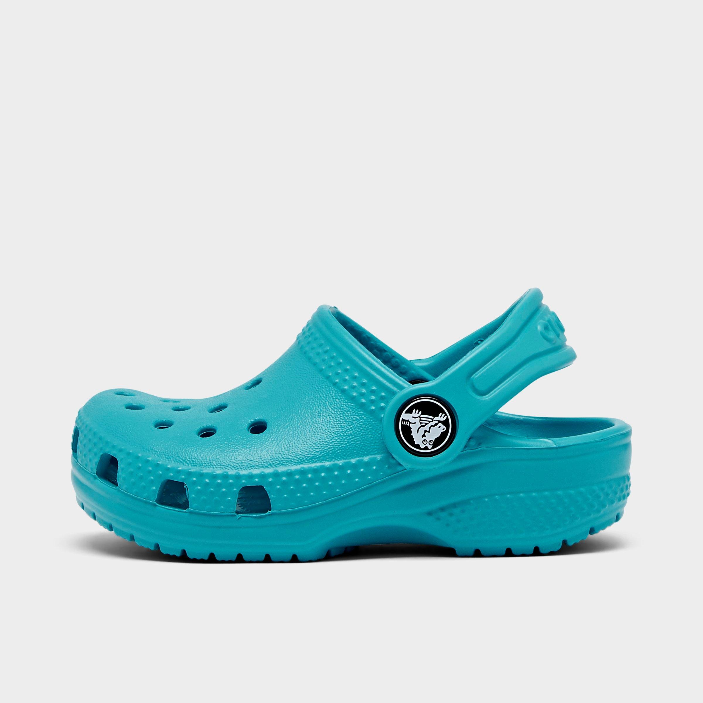 girls teal crocs