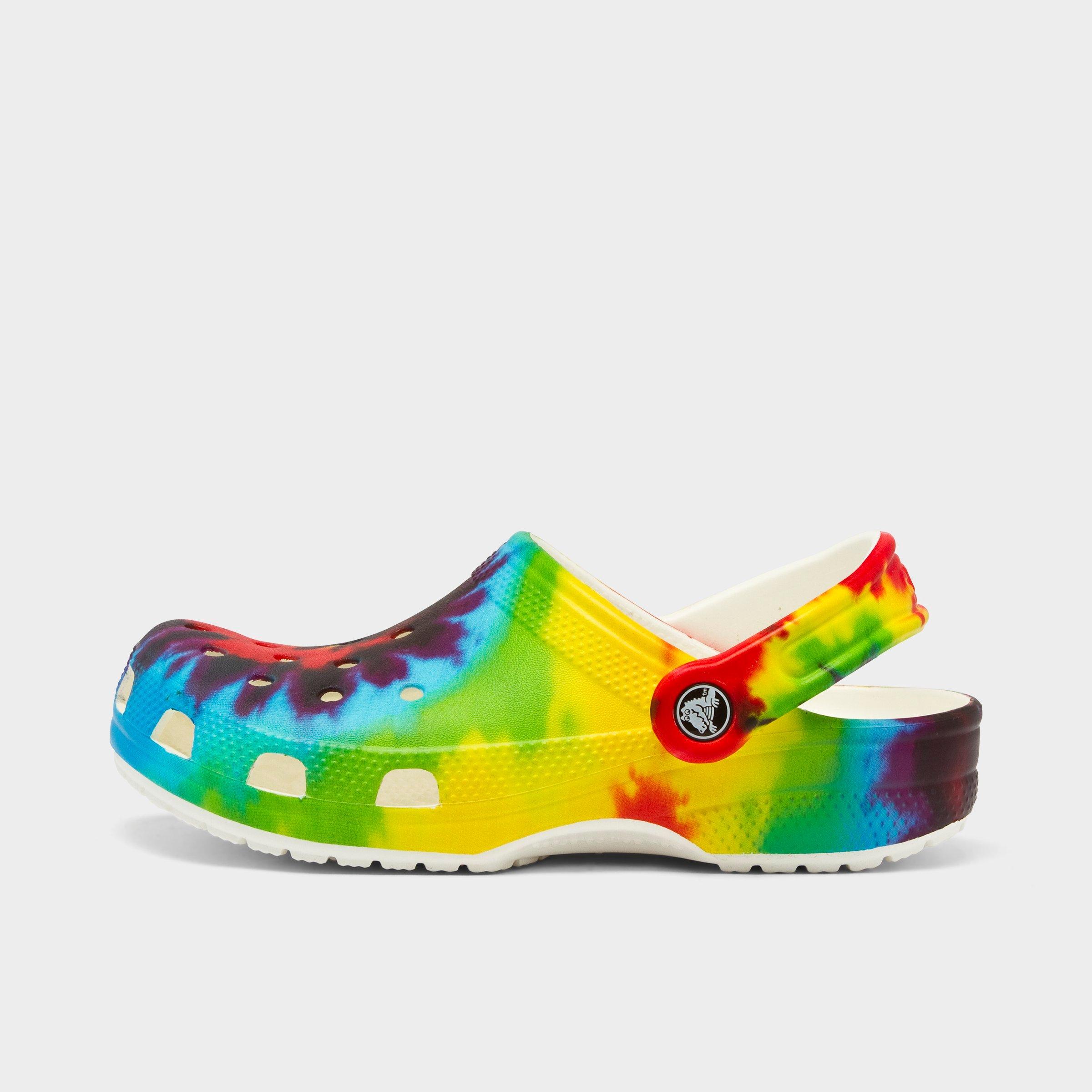 white crocs with colorful words