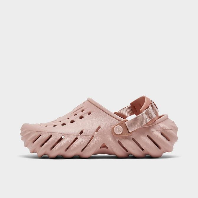 pink crocs with