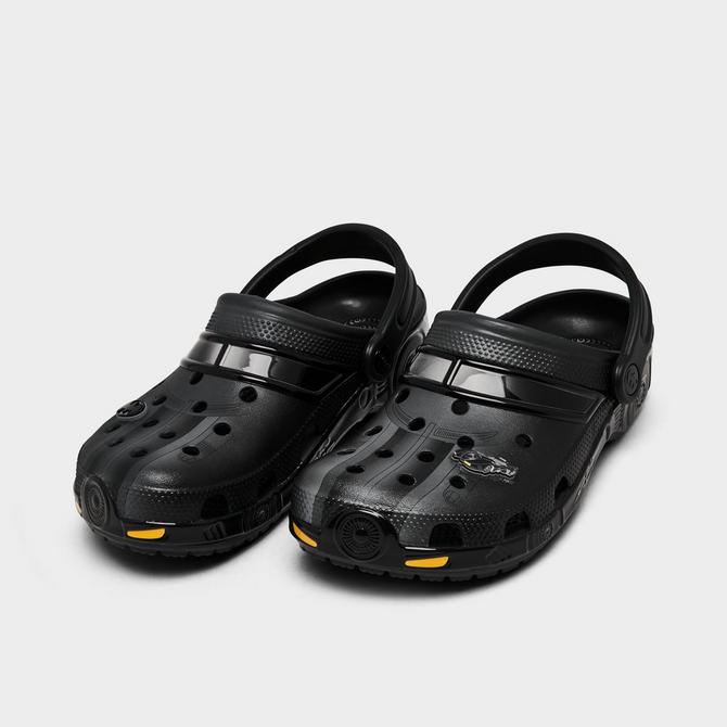 Three Quarter view of Big Kids' Crocs x Batman Batmobile Classic Clog Shoes in Black Click to zoom