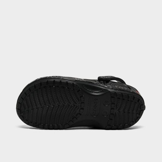 Bottom view of Big Kids' Crocs x Batman Batmobile Classic Clog Shoes in Black Click to zoom