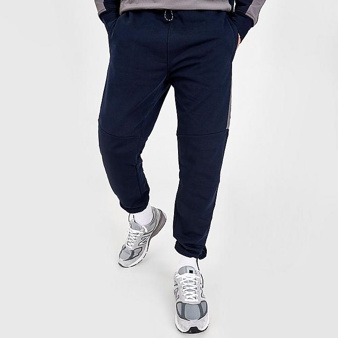 Front Three Quarter view of Men's NICCE Dax Jogger Pants in Deep Navy/Steel Grey Click to zoom