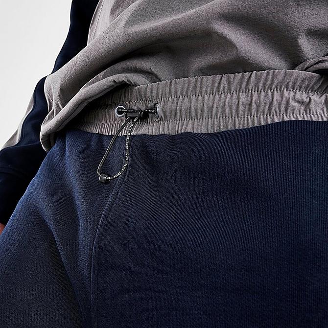 On Model 5 view of Men's NICCE Dax Jogger Pants in Deep Navy/Steel Grey Click to zoom