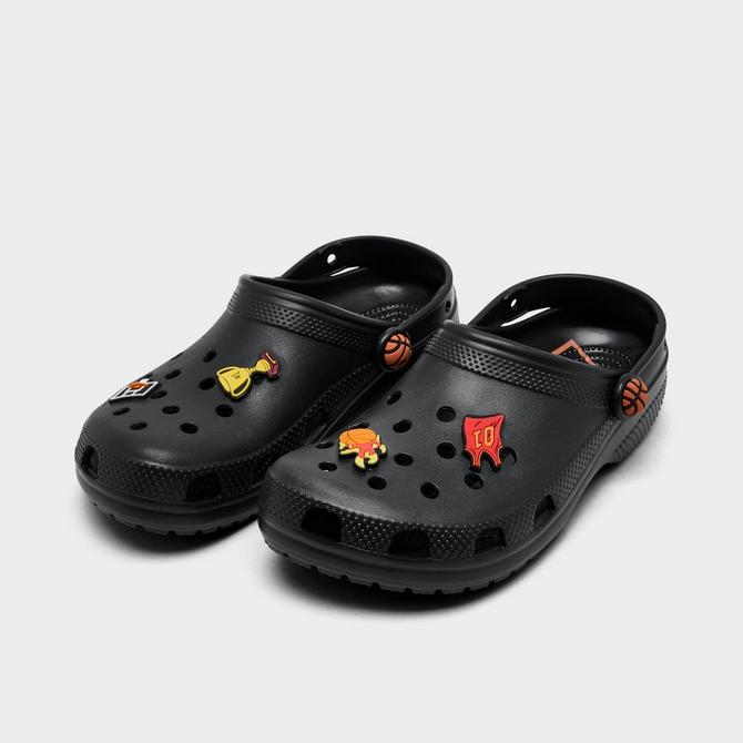 Three Quarter view of Big Kids' Crocs Basketball Classic Clog Shoes in Black Click to zoom