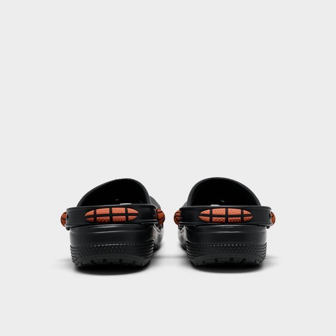 Left view of Big Kids' Crocs Basketball Classic Clog Shoes in Black Click to zoom