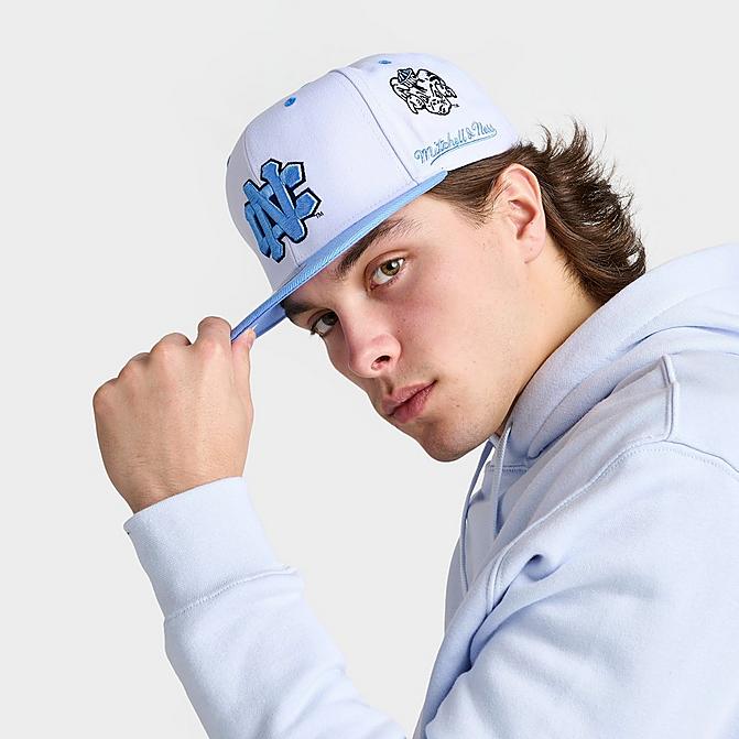 Right view of Mitchell & Ness North Carolina Tar Heels College Champs City Snapback Hat in White Click to zoom