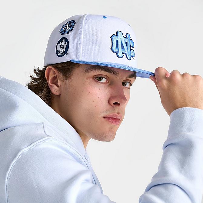 Three Quarter view of Mitchell & Ness North Carolina Tar Heels College Champs City Snapback Hat in White Click to zoom