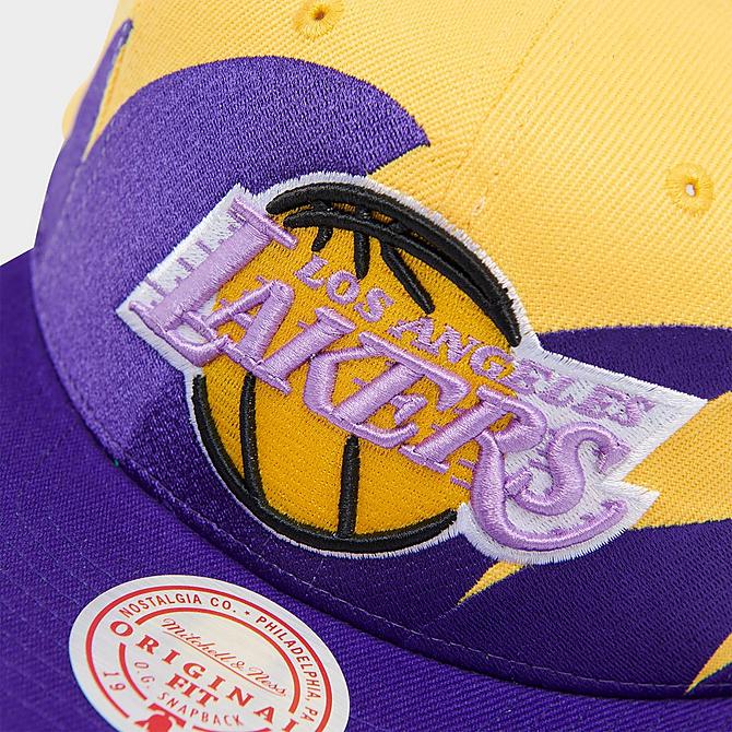 Left view of Mitchell & Ness Los Angeles Lakers NBA Hardwood Classics Snapback Hat in Yellow Click to zoom