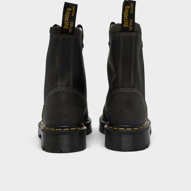 Left view of Women's Dr. Martens Anistone Low Leather Biker Boots in Black Click to zoom