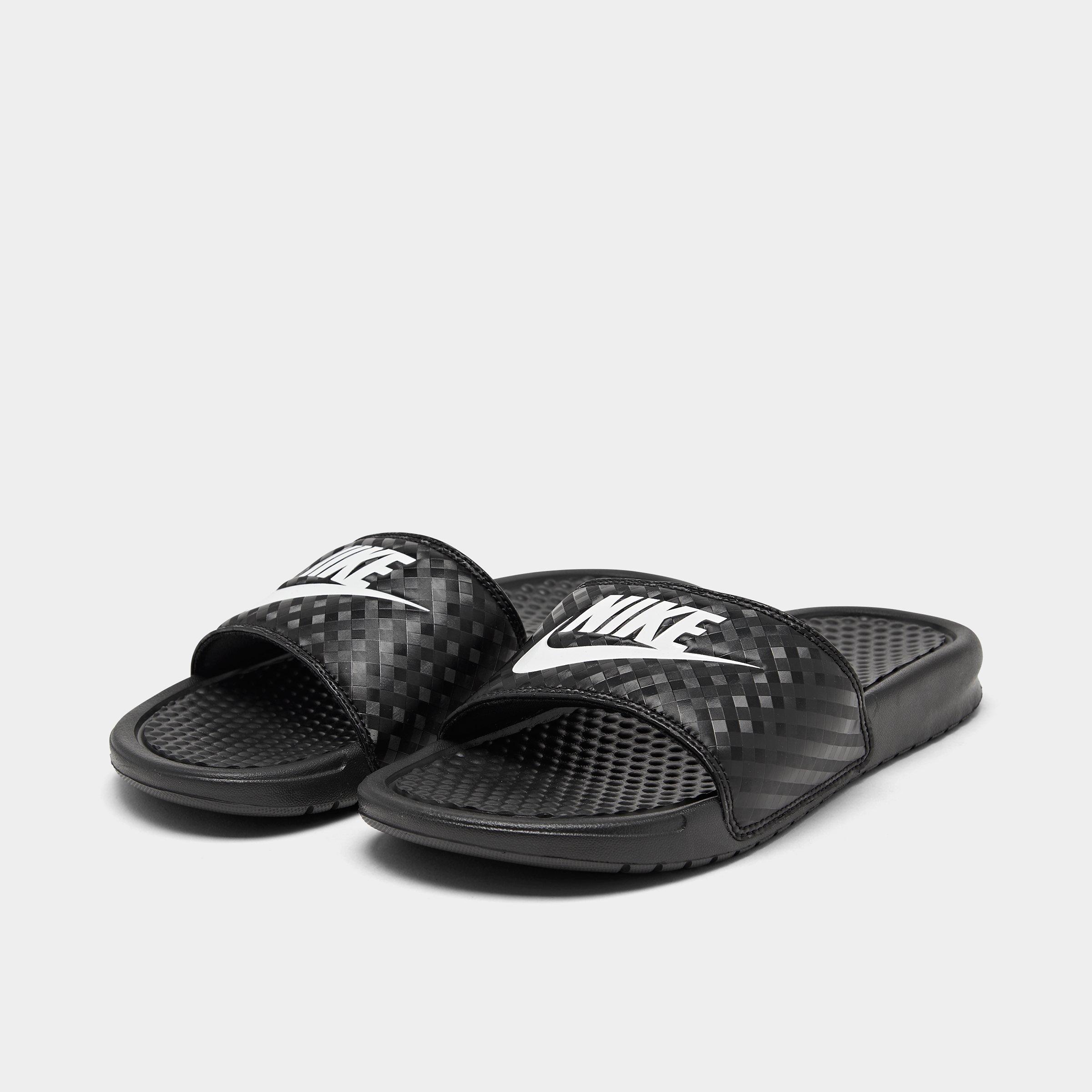 womens black and white nike slides