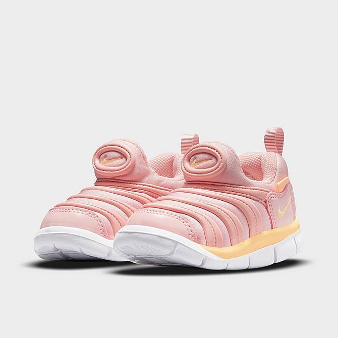 Three Quarter view of Kids' Toddler Nike Dynamo Free Casual Shoes in Pink Glaze/Light Violet Ore/Melon Tint Click to zoom