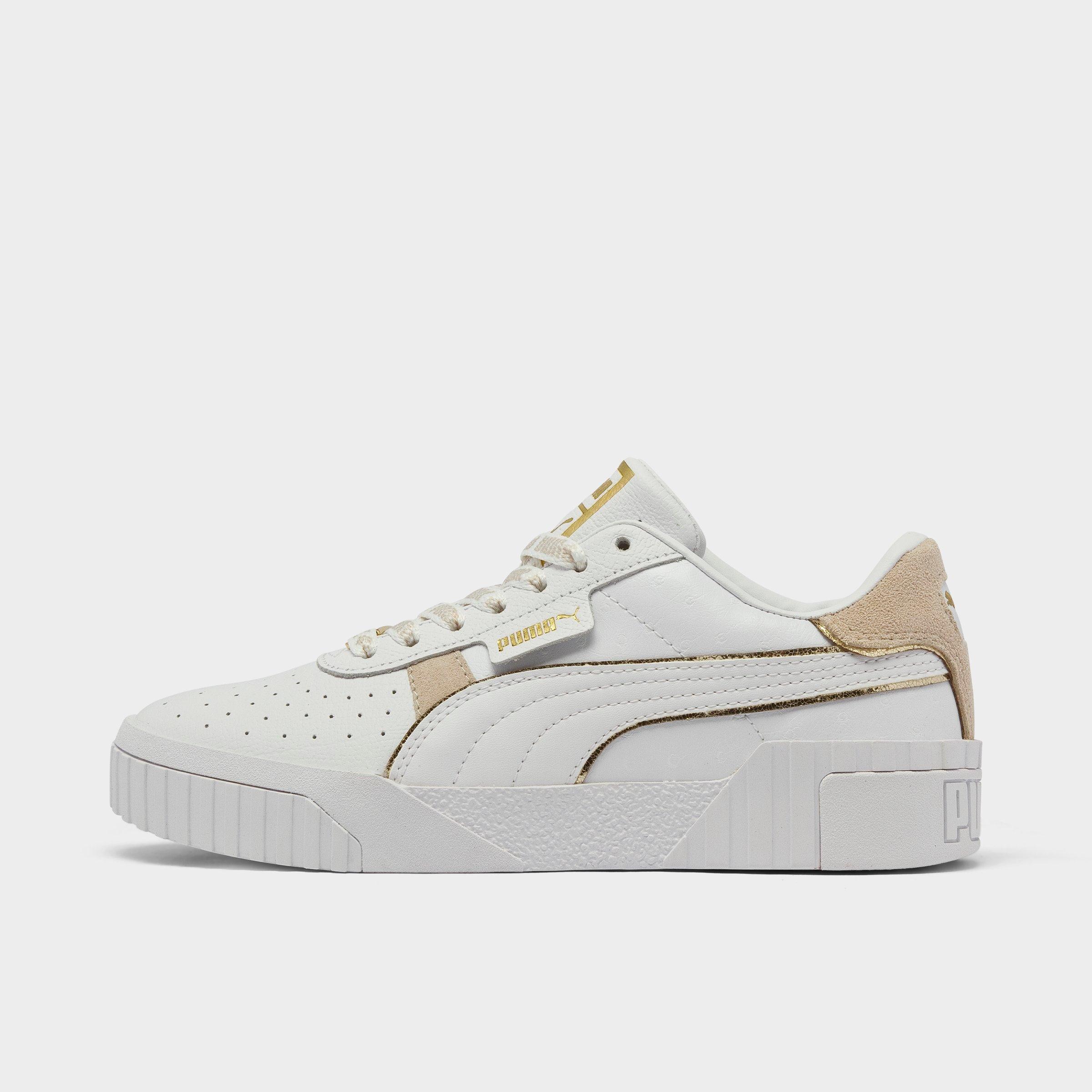 white and gold pumas