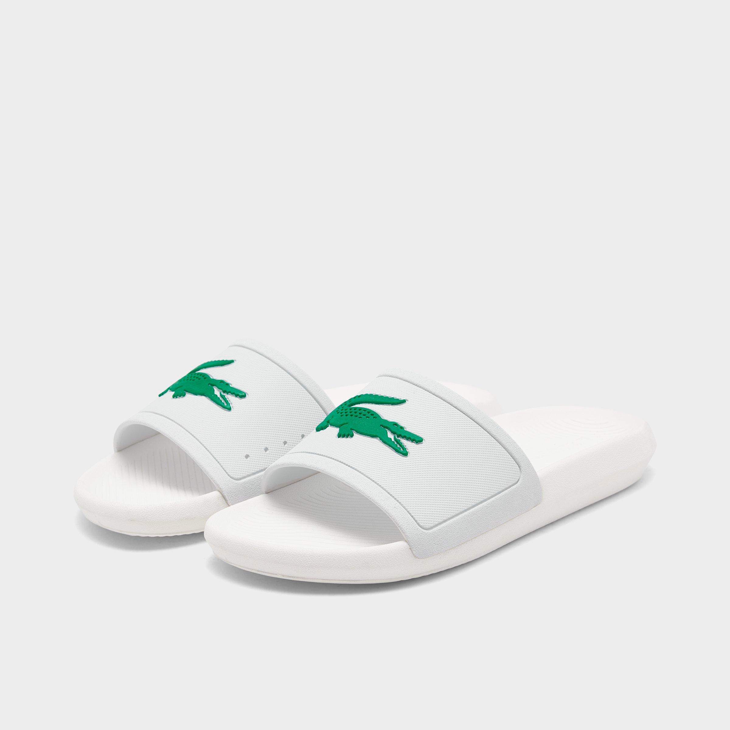 white lacoste slides