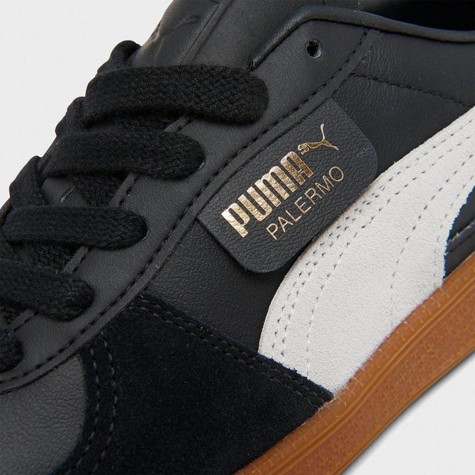 PUMA Palermo Leather sneakers in black and white