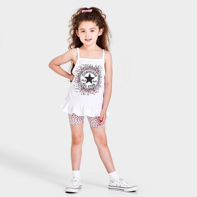 converse with shorts girl