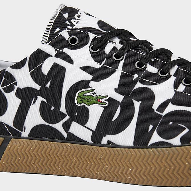 Front view of Men's Lacoste Gripshot All-Over Print Canvas Casual Shoes in Off-White/Navy Click to zoom