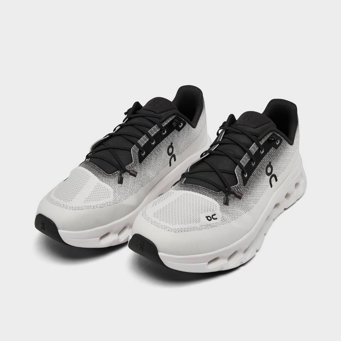 Three Quarter view of Men's On Cloudtilt Running Shoes in Black/Ivory Click to zoom
