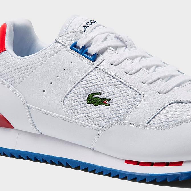 Front view of Men's Lacoste Partner Piste Casual Shoes in White/Blue/Multicolor Click to zoom