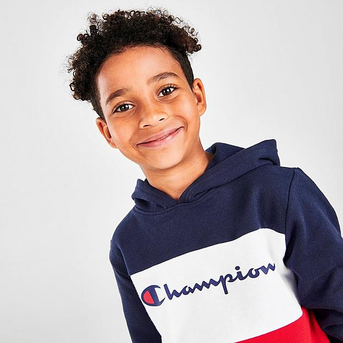 On Model 5 view of Boys' Little Kids' Champion Script Colorblock Fleece Hoodie and Joggers Set in Navy/White/Red Click to zoom