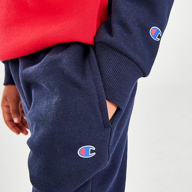 On Model 6 view of Boys' Little Kids' Champion Script Colorblock Fleece Hoodie and Joggers Set in Navy/White/Red Click to zoom