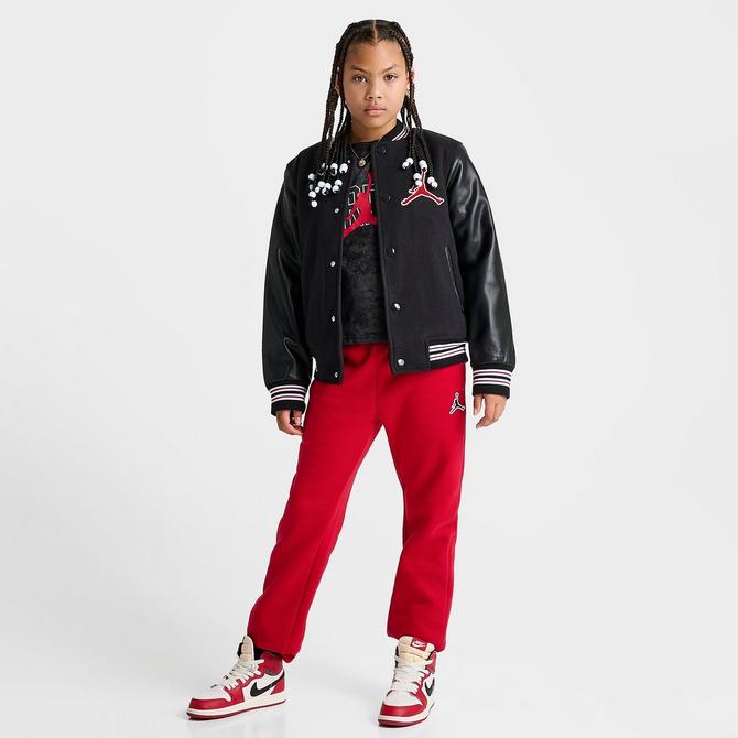 Jordan varsity jacket outlet black and white