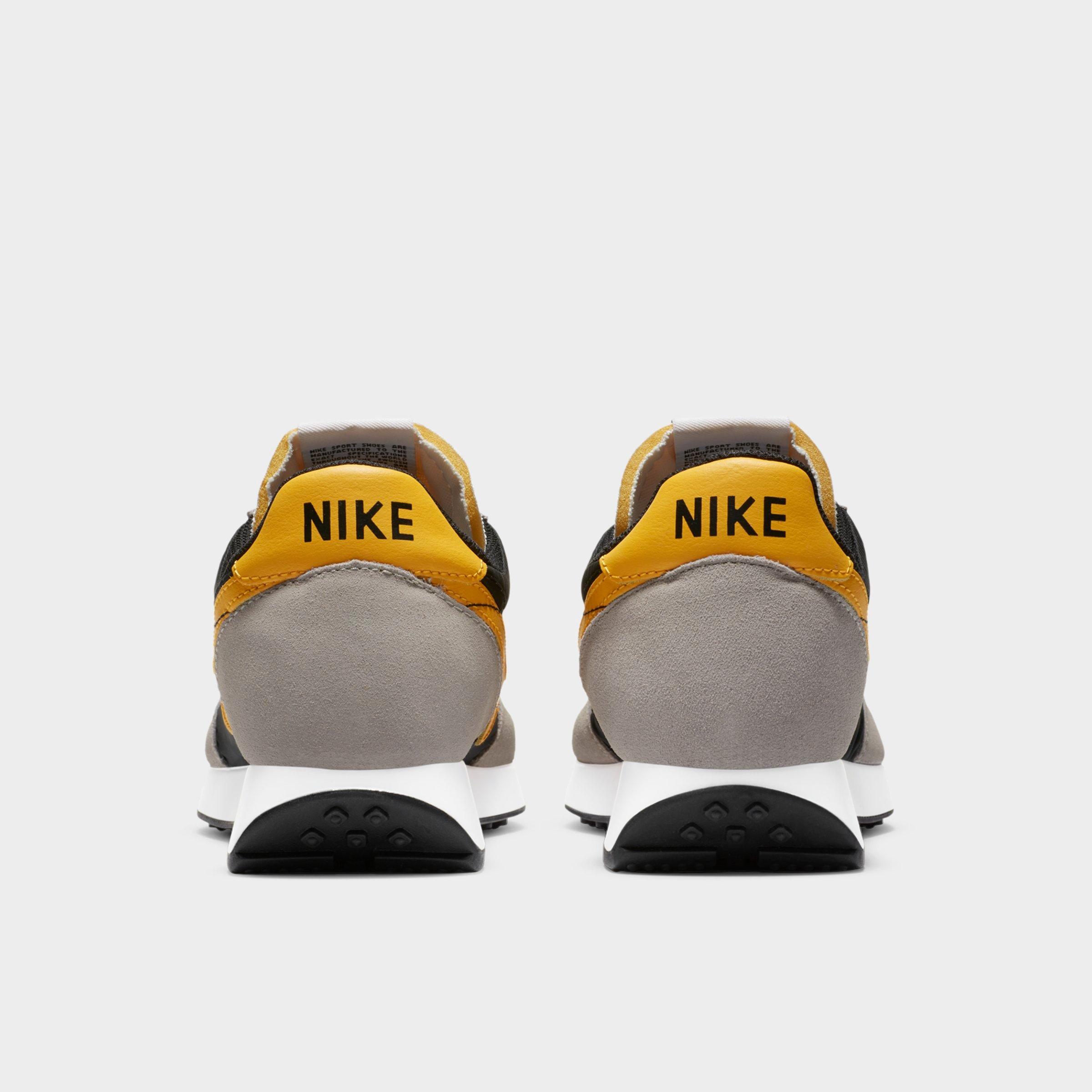 grey and gold nikes