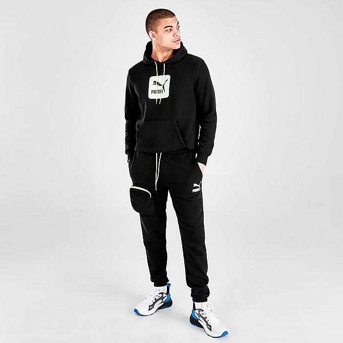 Front Three Quarter view of Men's Puma Lightsense Classic Sweatpants in Black Click to zoom