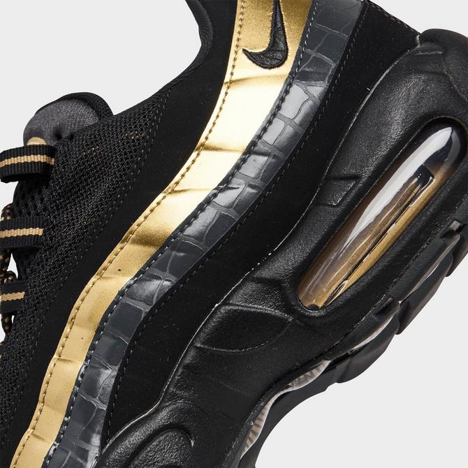 Nike 95 black on sale gold