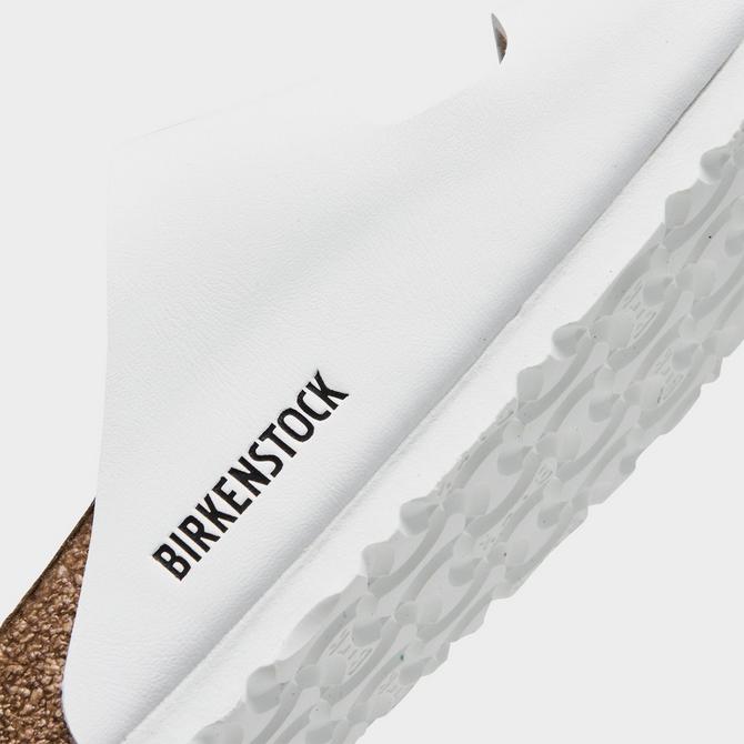 Front view of Women's Birkenstock Arizona Birkibuc Sandals (Big Kids Sizes Available) in White Click to zoom
