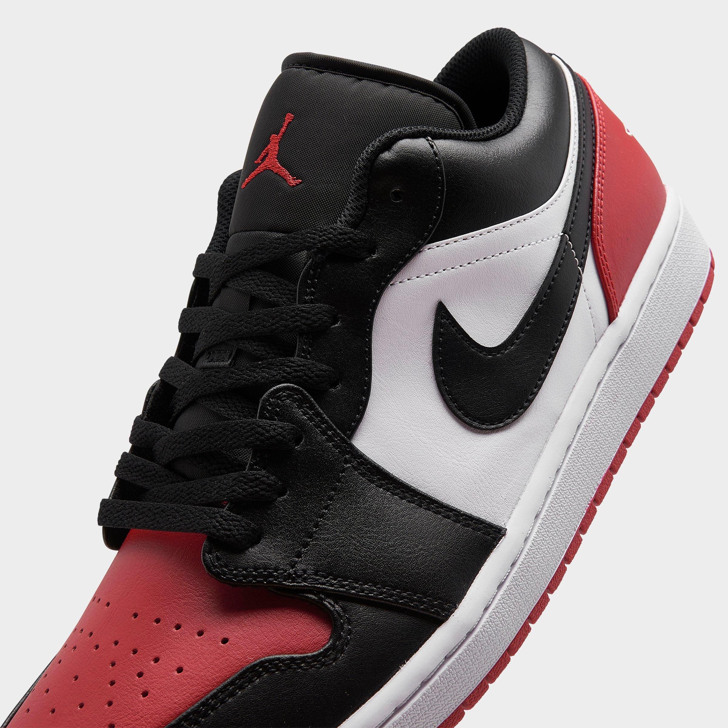 Nike Air Jordan 1 low sneakers in black and gym red