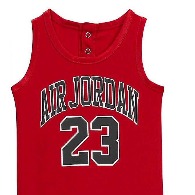 Front Three Quarter view of Boys' Infant Jordan Jersey Romper in Red/Black Click to zoom