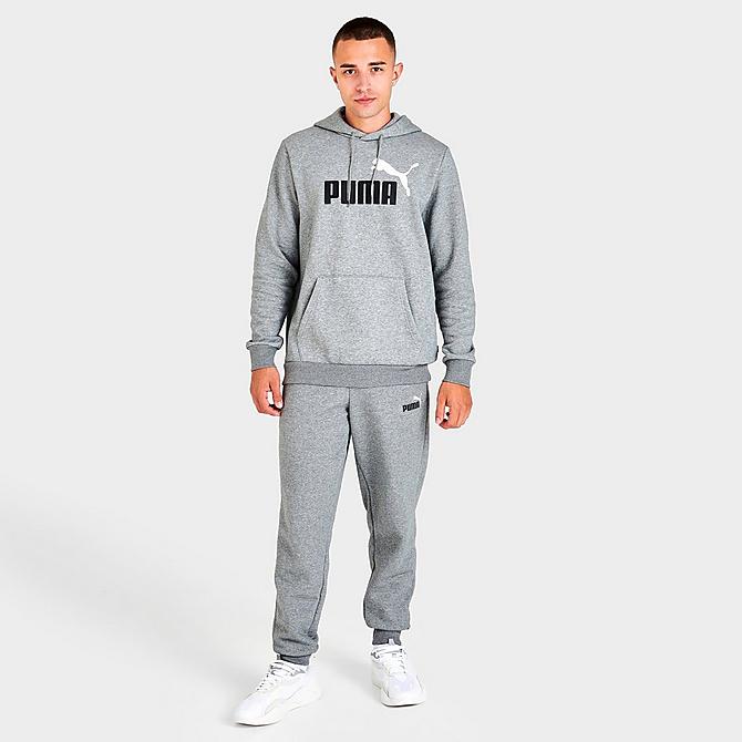 Front Three Quarter view of Men's Puma Essentials Logo Jogger Pants in Grey Click to zoom