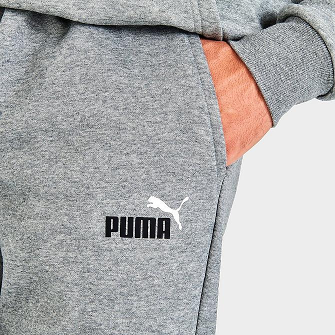 On Model 5 view of Men's Puma Essentials Logo Jogger Pants in Grey Click to zoom