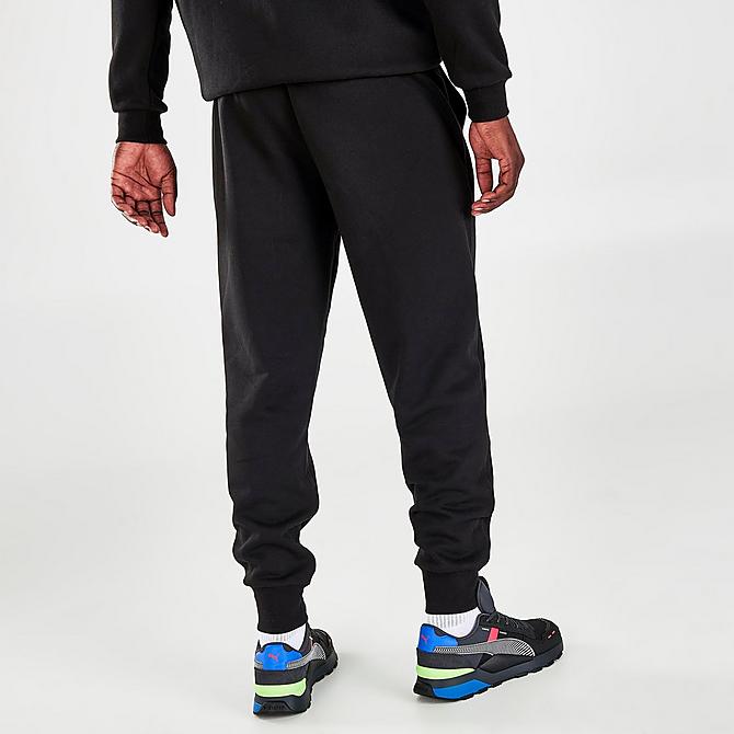Back Right view of Men's Puma Logo Jogger Pants in Black Click to zoom